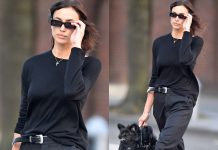 Irina Shayk in nero a New York con il cane nella borsa di Hermès
